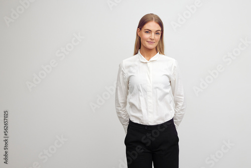 Portrait of beautiful and confident young business woman, isolated on white background
