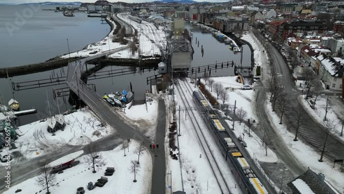 Train chase with drone towards Trondheim Railway station. 4K photo