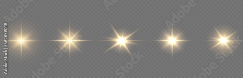 Golden light vectors.Bright gold star.Light flash.Gold glitter.