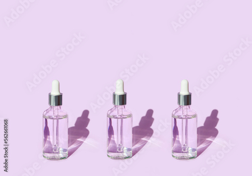 serum on a pink background with natural light 