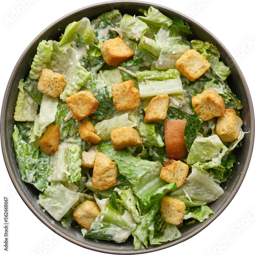 Caesar salad top down view in rustic bowl isolated