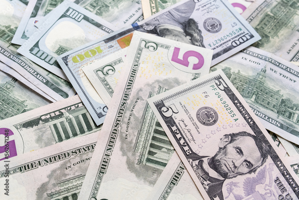 Background from different banknotes of dollars and euros. Background from different banknotes of dollars and euros.