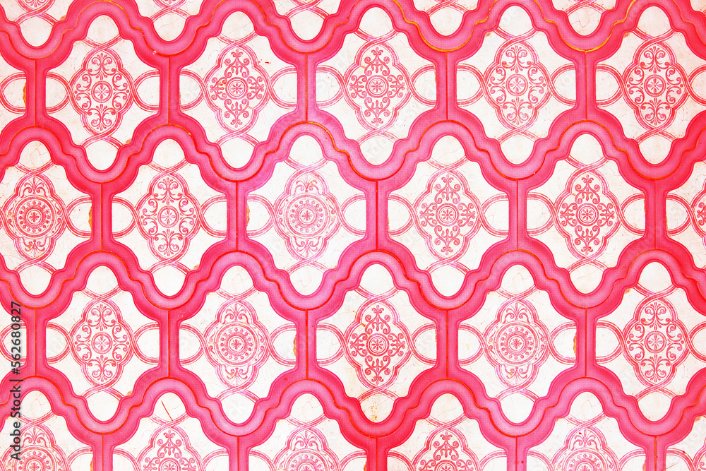 Ceramic tiles with a pink eastern pattern.