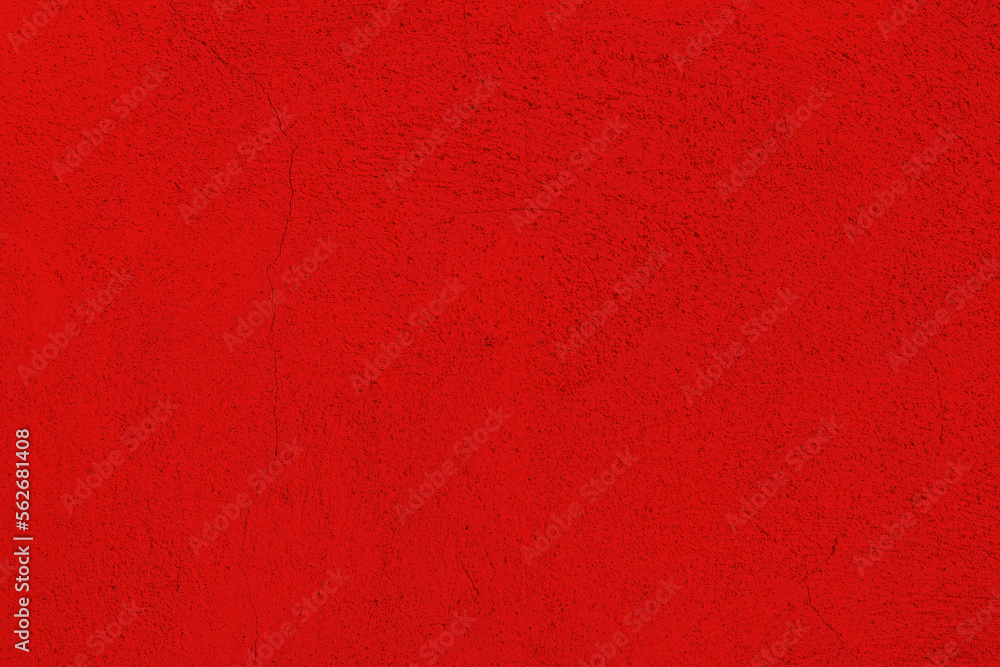 Fototapeta premium Red abstract background, plaster texture, old painted facade of the building, with a crack.