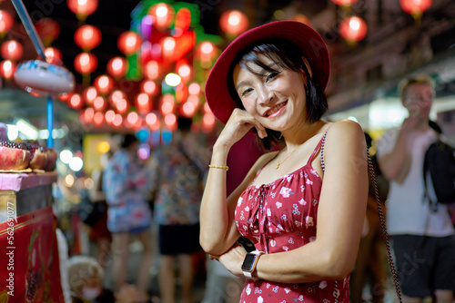 thai woman at nightmarket in yaowarat china town bangkok during chinese new year © Joshua Resnick