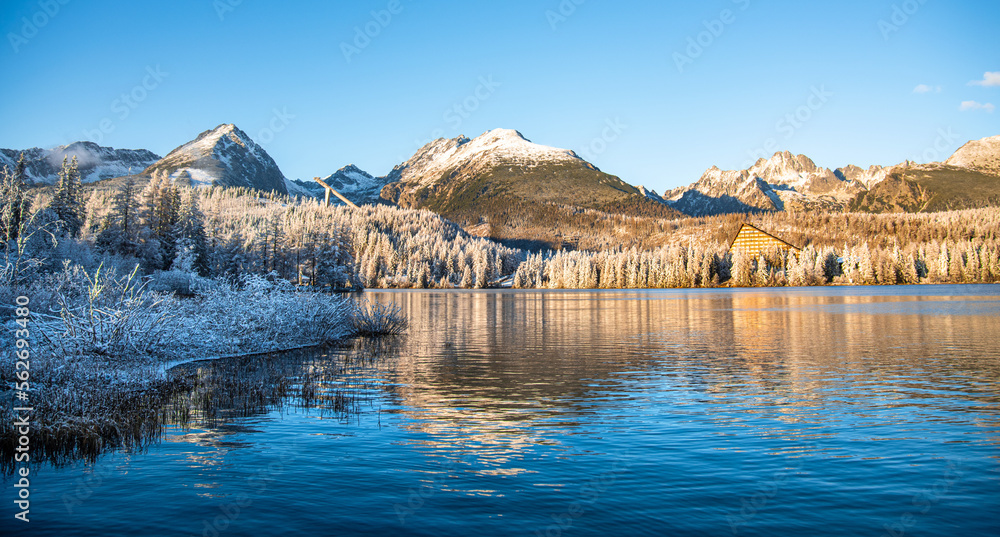 Reflection of mountain lake in High Tatras, Slovakia.  Strbske pleso in the winter.