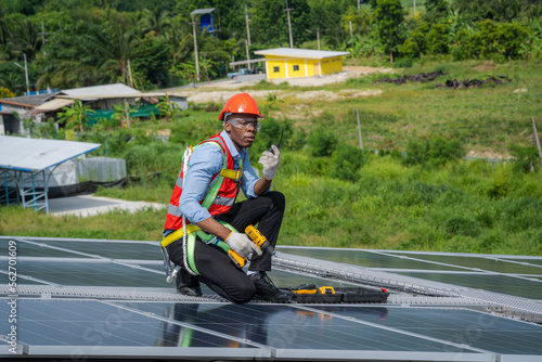 Operation and maintenance in solar power plant,Engineering checking and maintenance on solar cell on roof factory.