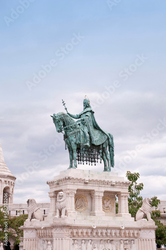 Statue of Saint Stephen, Fishermans Bastion in background, Budapest, Hungary photo