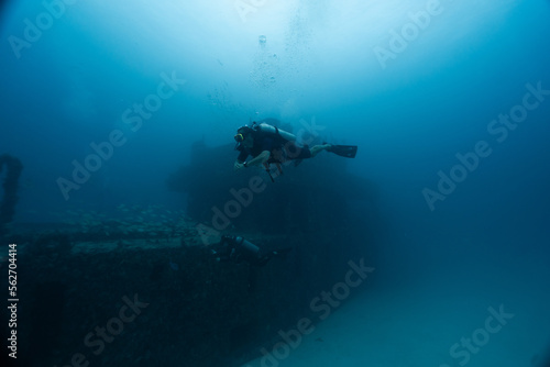 Wallpaper Mural male diver posing in front of a sunken ship, technical diving Torontodigital.ca