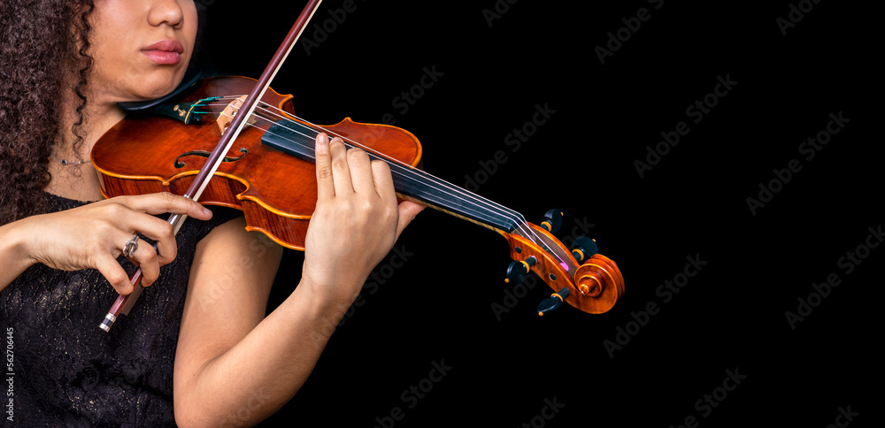 professional violinist playing violin with black space on the right.