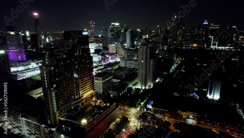 Wallpaper Mural Aircraft circling some tall buildings, Bangkok, Thailand at night Torontodigital.ca