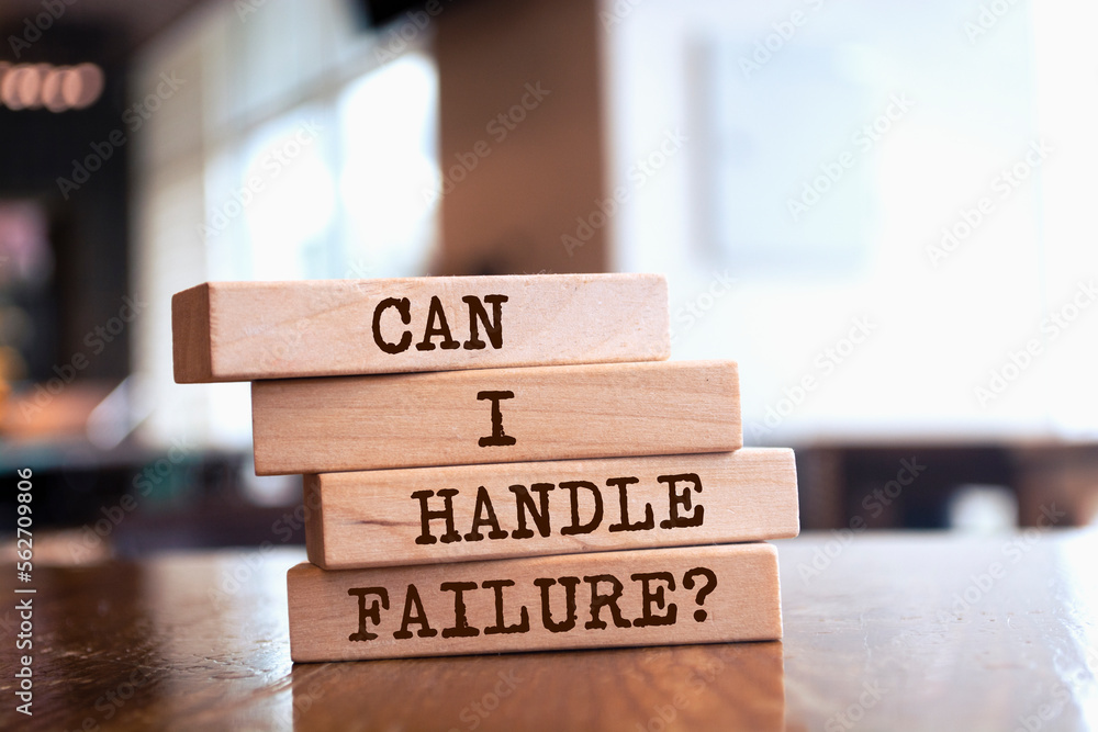 Wooden blocks with words 'Can I Handle Failure?'. Wooden blocks with words 'Can I Handle Failure?'.