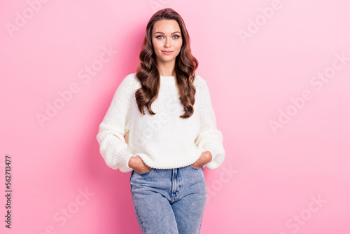 Portrait of positive adorable person put arms pockets posing isolated on pink color background © deagreez