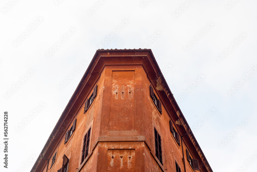 A piece of an apartment building, a house. An empty space. Architecture.