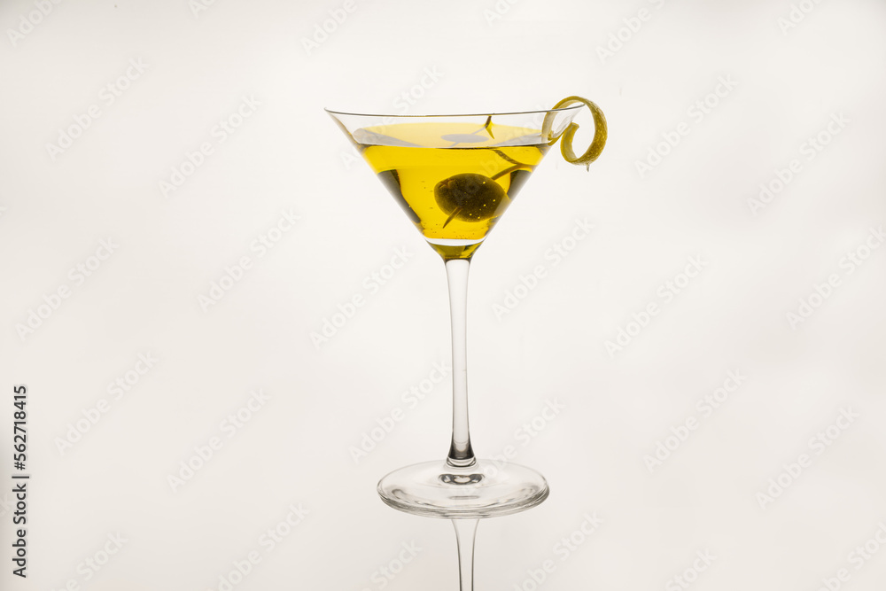 classic sidecar cocktail with a lemon twist isolated on a white background