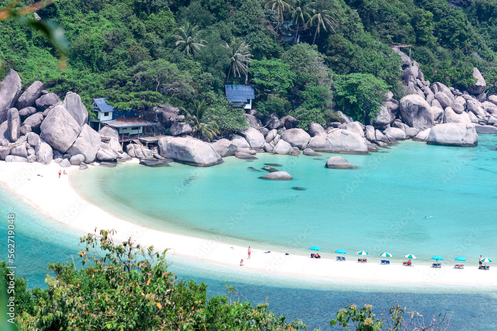 Beautiful white sand beach with green mountain and crystal clear waterblue sea, tropical ocean nature scenes with summer beach looking for Koh Nang Yuan island viewpoint, Surat Thani, Thailand.