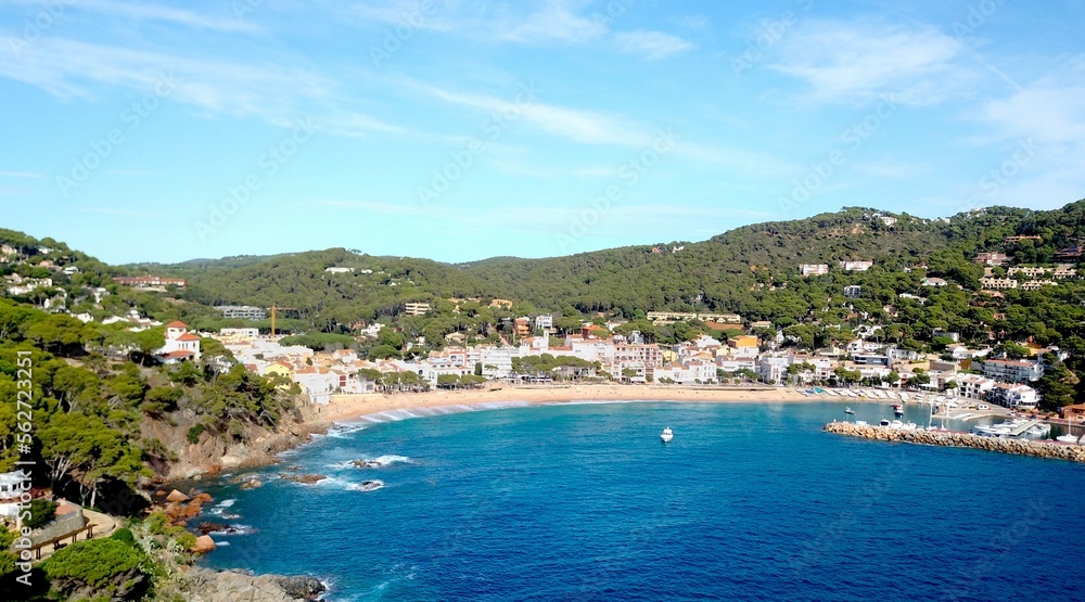 aerial view from the Mediterranean Sea on the beautiful seaside town of Llafanc at the Costa Brava, fishing village, tourism, Palafrugell, Baix Empordà, Girona, Catalonia, Spain