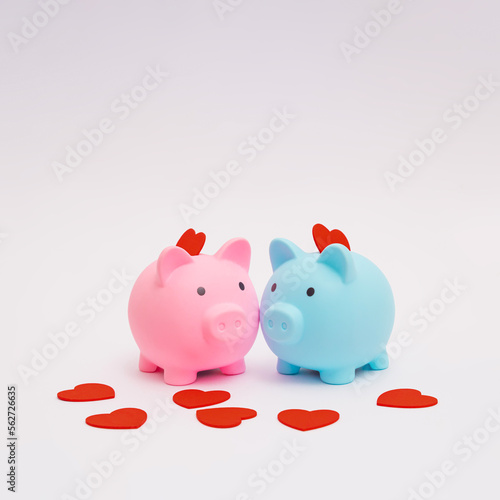 Pink and blue piggy banks in love with red hearts. Concept of love and saving.