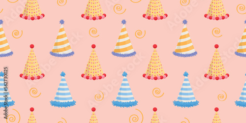 Colorful party hats on pink background