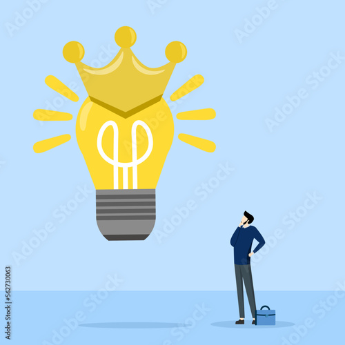 Brilliant idea concept, Shiny shining light bulb idea lamp wearing golden crown. Great and brilliant ideas, creative geniuses or winning ideas for business development.