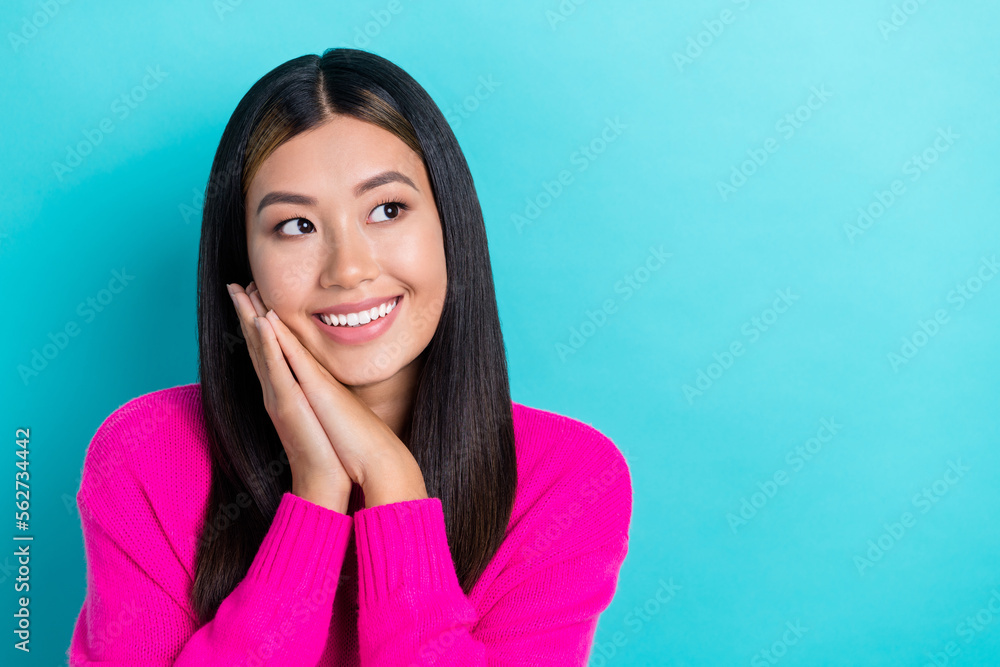 Photo of adorable lovely lady wear pink stylish clothes arms under cheeks interested look empty space isolated on cyan color background Photo of adorable lovely lady wear pink stylish clothes arms under cheeks interested look empty space isolated on cyan color background