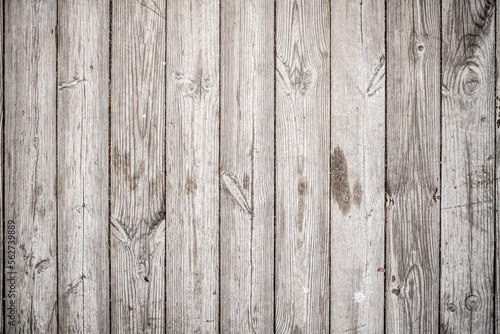 Old gray wooden fence, background texture.
