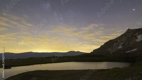 Day turning to night in mountains photo