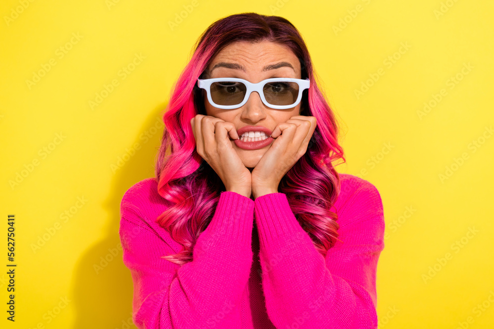 Portrait of terrified lady arms touch cheekbones teeth grinning wear 3d glasses isolated on yellow color background Portrait of terrified lady arms touch cheekbones teeth grinning wear 3d glasses isolated on yellow color background
