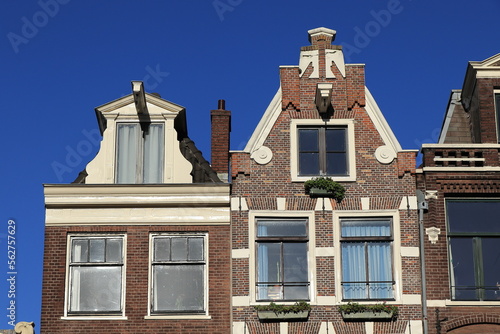 Amsterdam Bloemgracht Canal House Facades Close Up with Bright Blue Sky, Netherlands photo