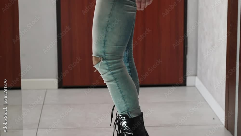 I love them so much, a young man posing in front of a mirror with high heels. High quality 4k footage I love them so much, a young man posing in front of a mirror with high heels. High quality 4k footage