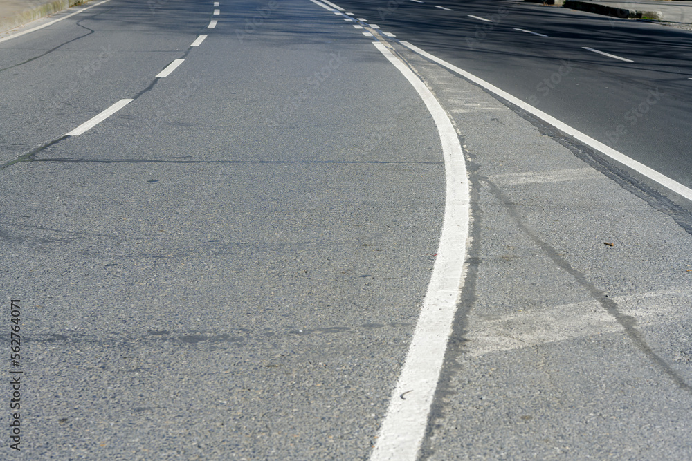 Road strip, line asphalt texture close up. sign on asphalt Road strip, line asphalt texture close up. sign on asphalt