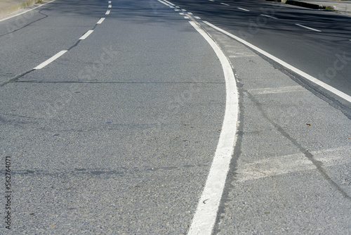 Road strip, line asphalt texture close up. sign on asphalt 