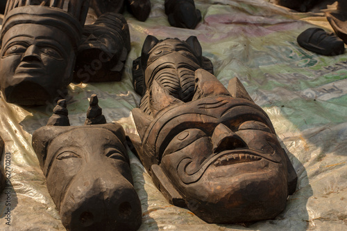 Beautiful traditional musk of tribals, works of handicraft, for sale during Handicraft Fair in Kolkata. Selective focus.