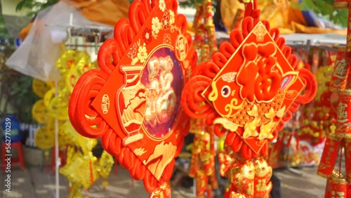 Red Chinese flashlight during the day. New Year's Fair with Chinese red lanterns and decorations. TET holiday in Vietnam. Chinese New Year. 