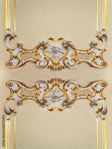 Golden decorative kaleidoscope mosaic baroque ornament pattern of original decoration from  historical buildin
g in Bratislava. Geometric design for fabric, textile print, 
wrapping paper, cover.
