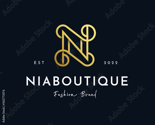 Elegant luxury gold N letter logo design