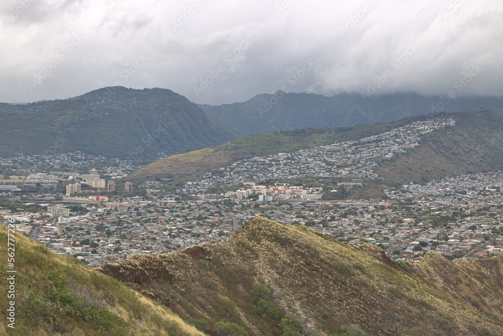 Manoa neighborhood and Koolau mountains covered in clouds