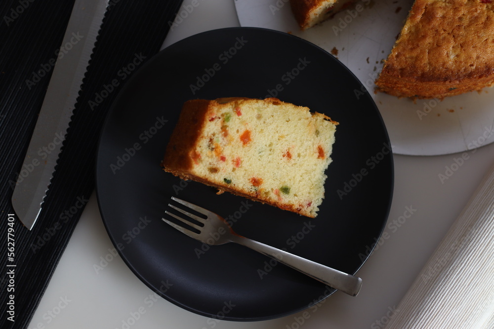 Sliced Tutti fruity buttermilk cake. A type of Indian fruit cake made