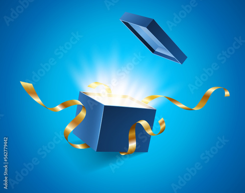 Blue opened 3d realistic gift box with magical shining glow and golden ribbons flying off cover, place for your text vector illustration