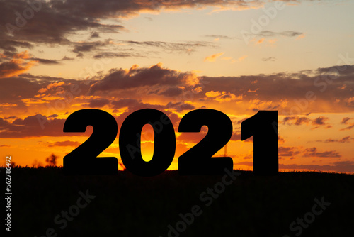Year change. The beginning of a new year. New year concept. Symbol of start and greetings happy new year 2021. People enter 2021.