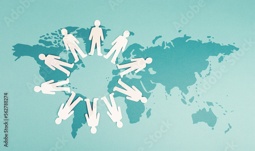 Group of men staning in a circle, on the world map, global communication, network and business, globalisation and friendship photo