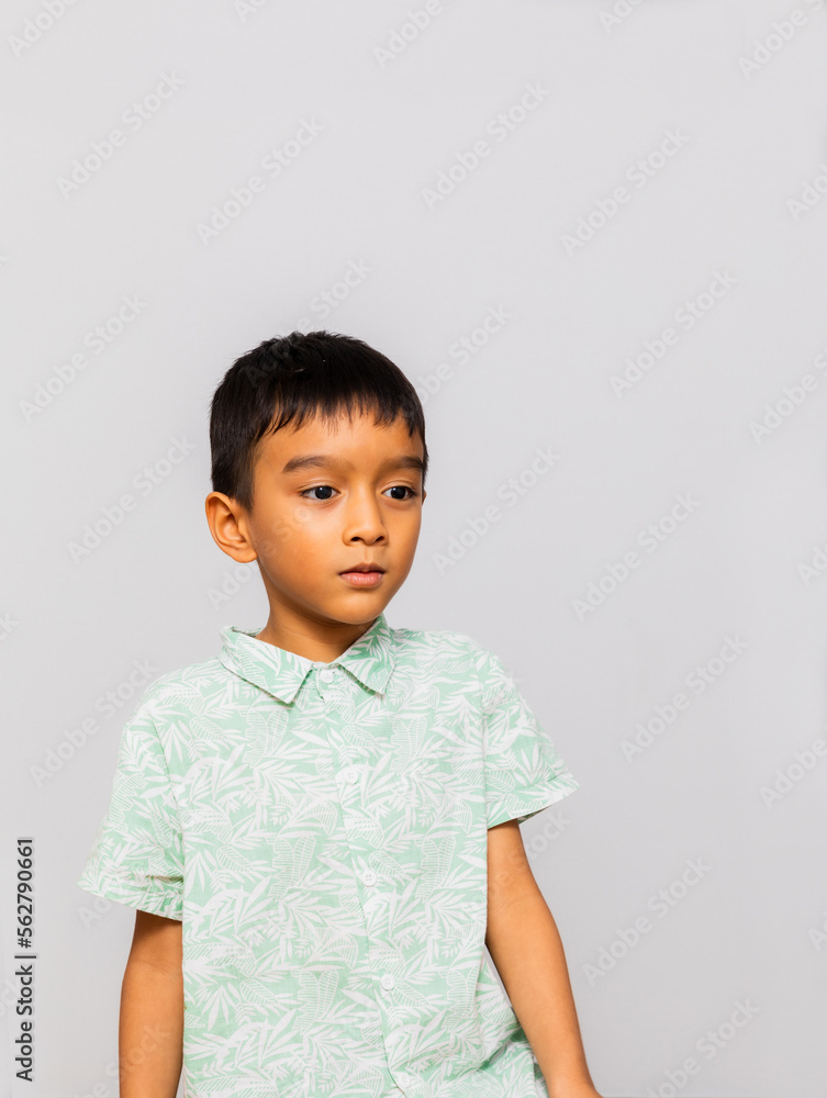 Cute little boy in casual outfit on background Cute little boy in casual outfit on background
