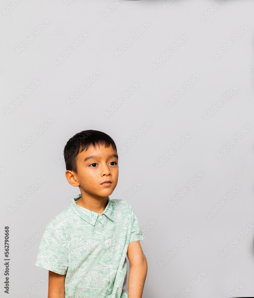 Cute little boy in casual outfit on background Cute little boy in casual outfit on background