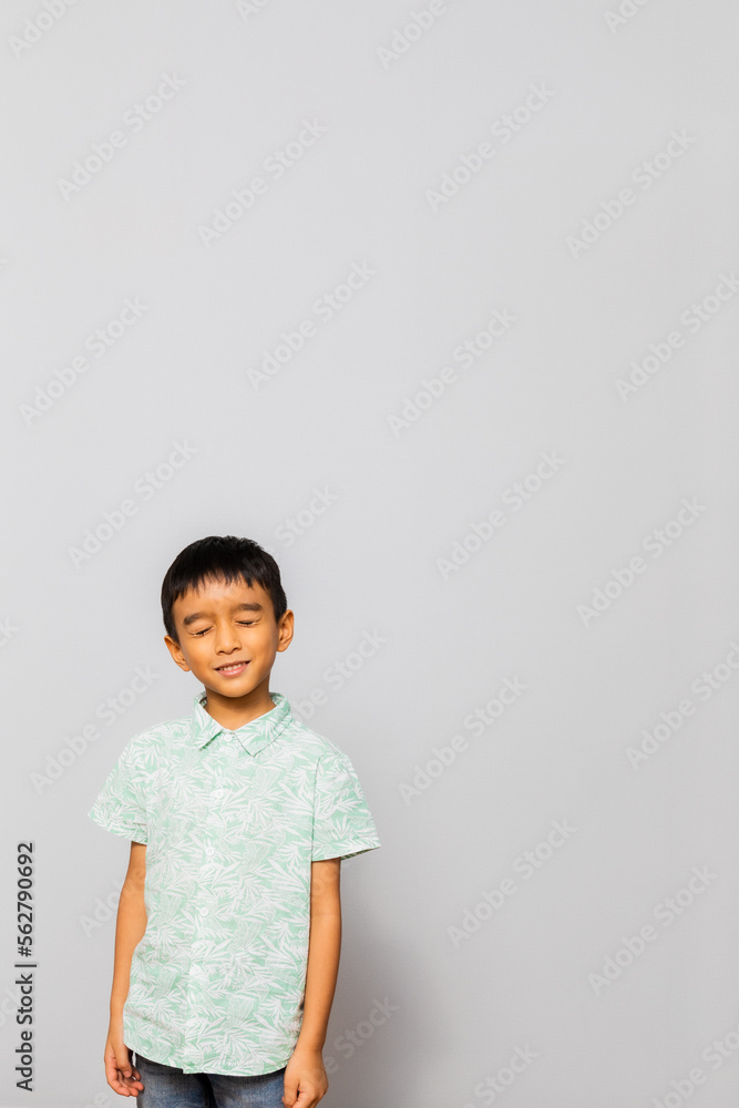 Cute little boy in casual outfit on background Cute little boy in casual outfit on background