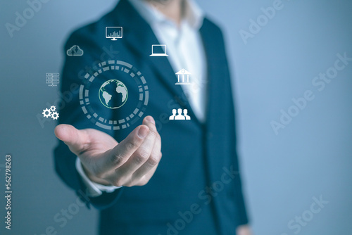 Digital marketing, Global business, IoT Internet of Things, business strategy concept. Businessman touching on global network with technology icons