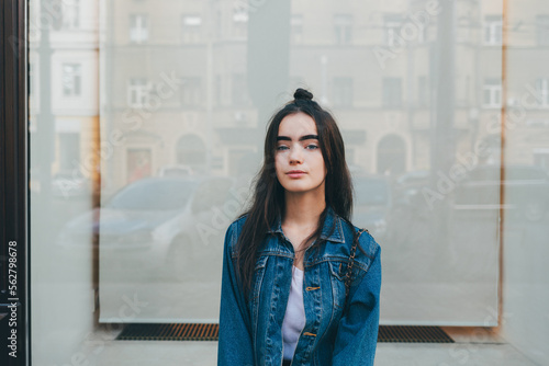 Young woman looks at the camera