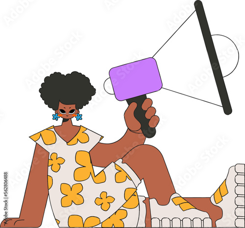 Stylish woman sits on the floor and holds a megaphone in her hand.