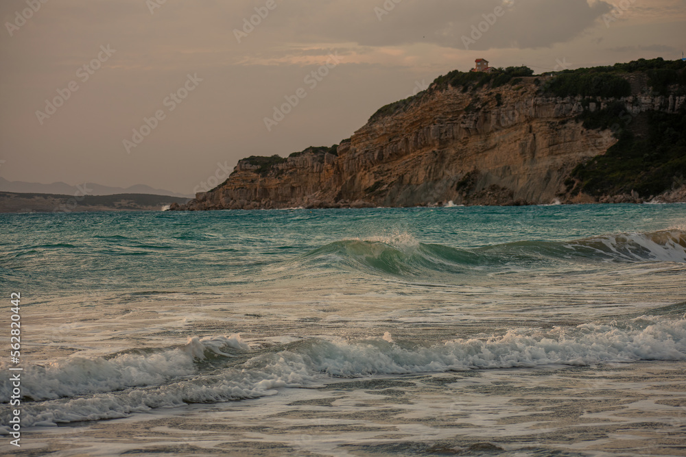 Beautiful sunset  with stormy sea during a windy day in Corfu island, Greece