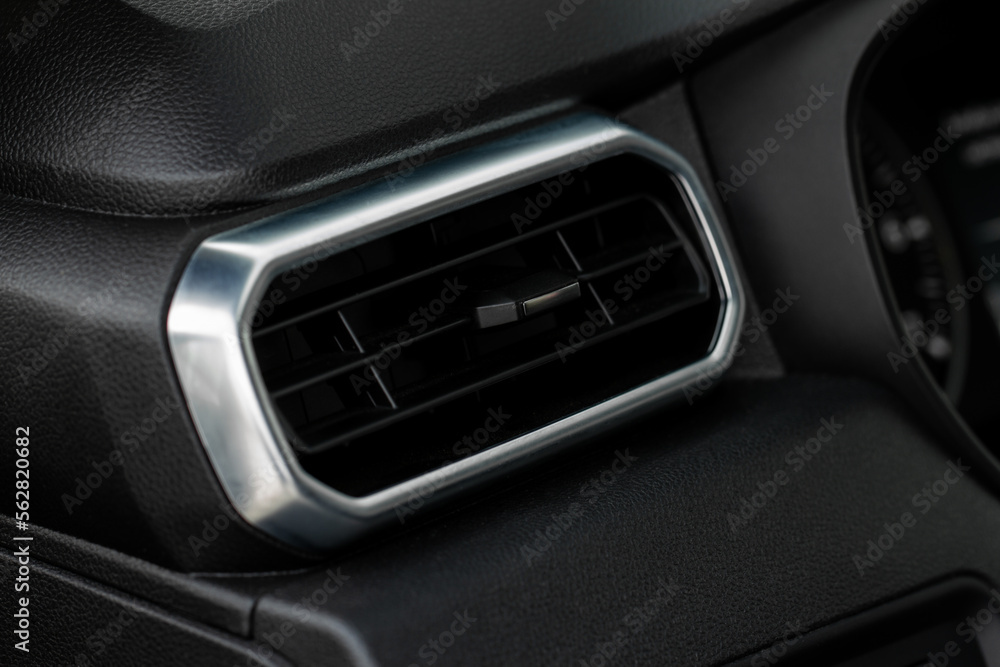 Car air conditioning. The air flow inside the car. Detail interior of a modern car.