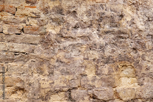 Old wall of brick and clay